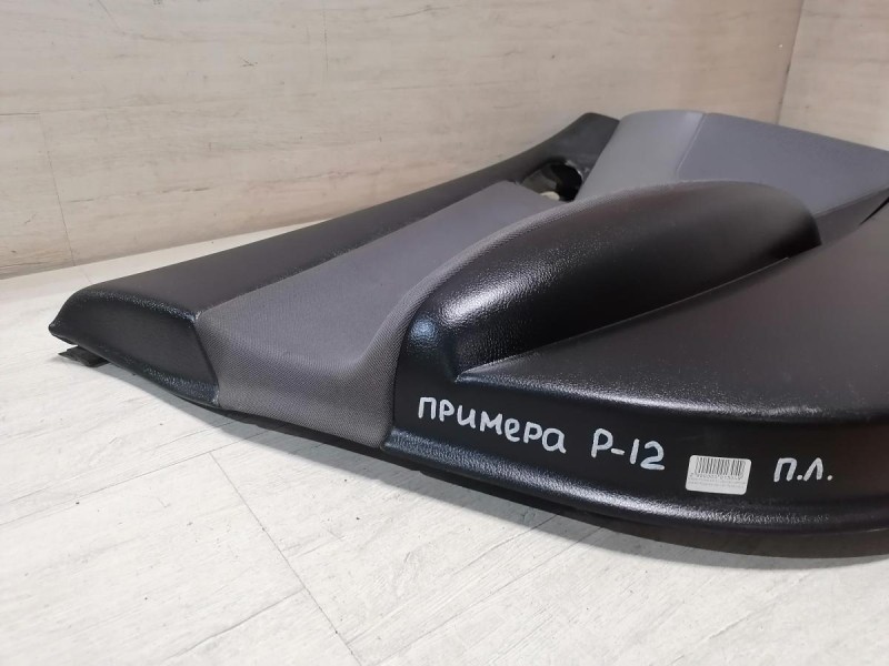 Primera P12 обшивка двери передняя левая