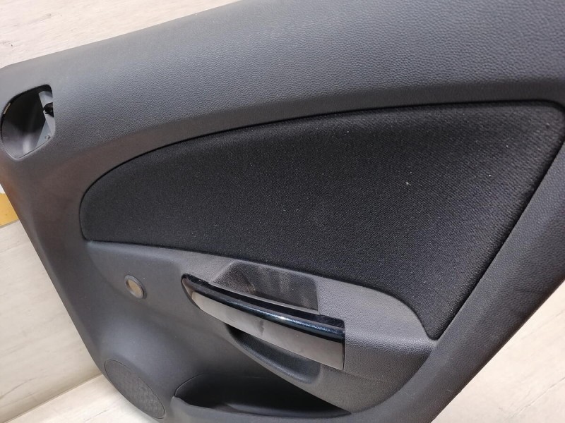 Corsa D обшивка двери задняя правая мех