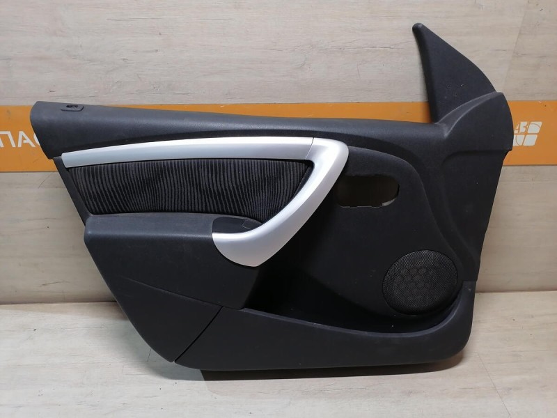 Sandero 1 обшивка двери передняя левая эл