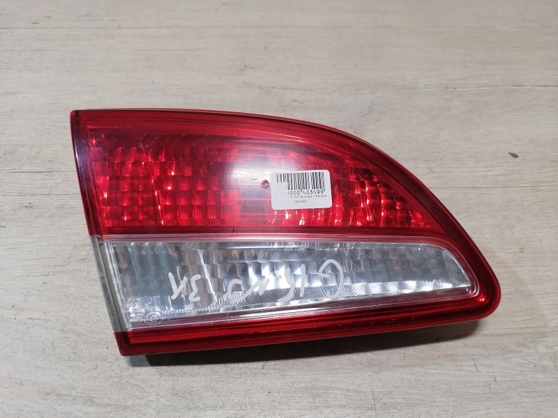 Almera G15 №9 фонарь в крышку багажника левый деф