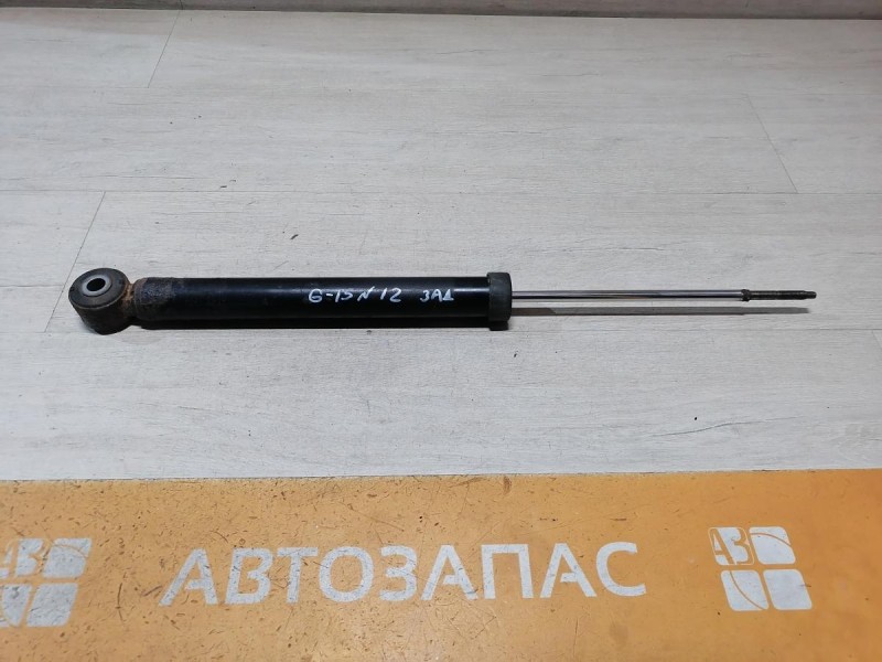 Almera G15 амортизатор задний