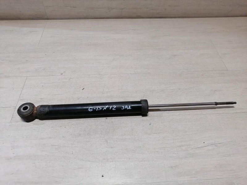 Almera G15 амортизатор задний