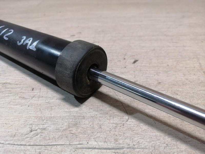 Almera G15 амортизатор задний