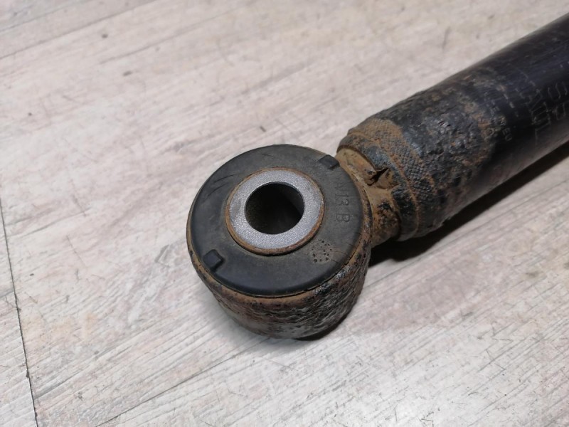 Almera G15 амортизатор задний