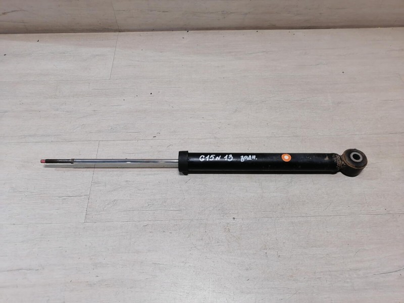 Almera G15 амортизатор задний