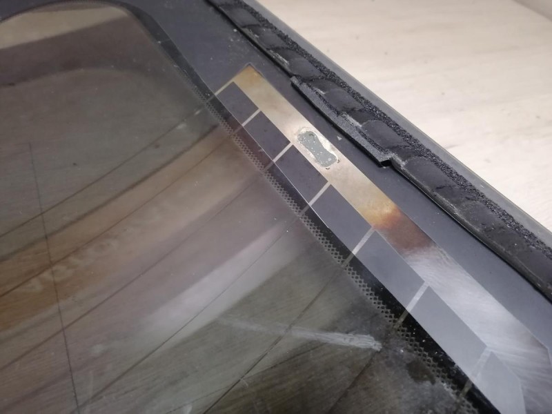 Almera G15 №12 стекло заднее 12 деф