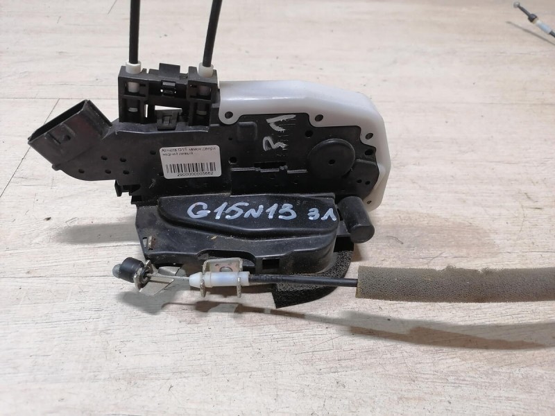 Almera G15 замок двери задний левый