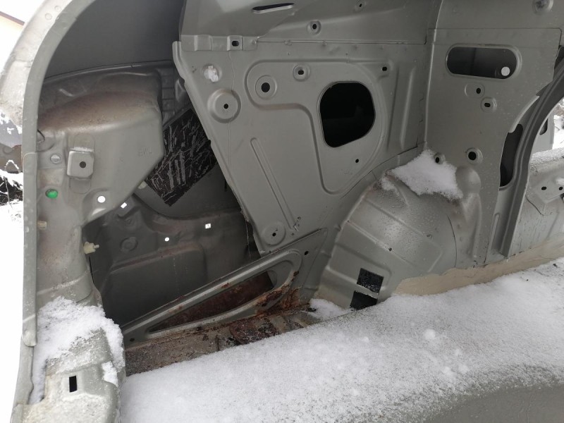 Almera G15 №12 крыло заднее левое деф