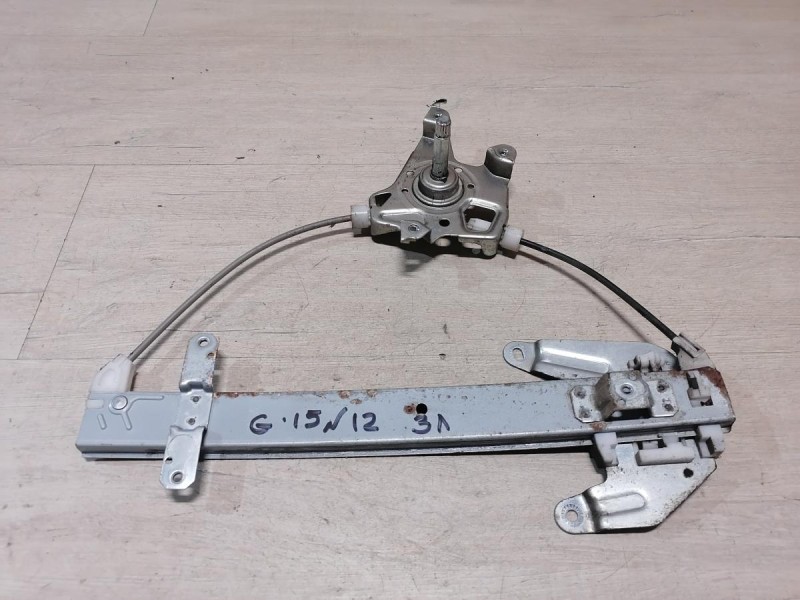 Almera G15 стеклоподъемник задний левый мех.