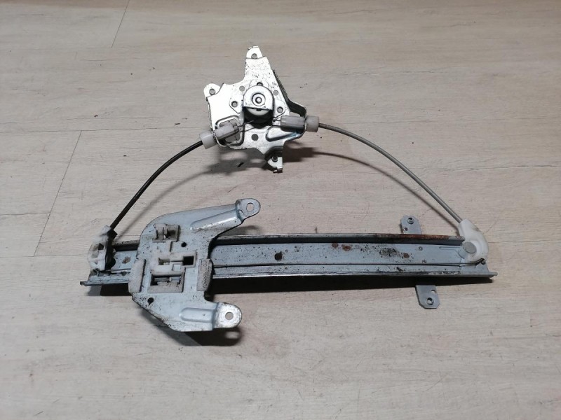 Almera G15 стеклоподъемник задний левый мех.