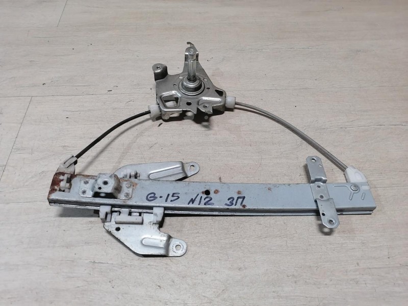 Almera G15 стеклоподъемник задний правый мех.