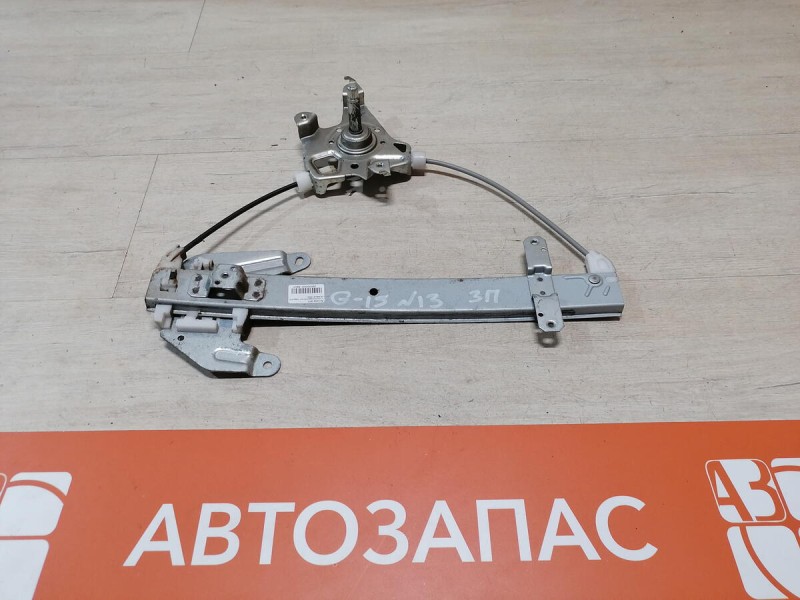 Almera G15 стеклоподъемник задний правый мех.