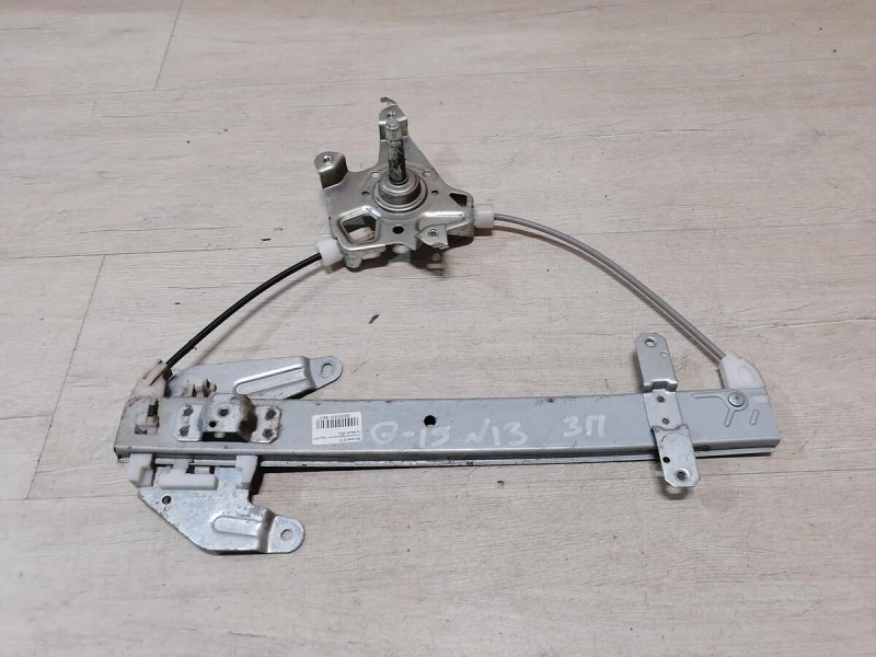 Almera G15 стеклоподъемник задний правый мех.