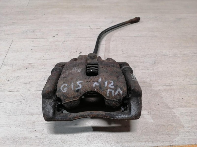 Almera G15 суппорт левый