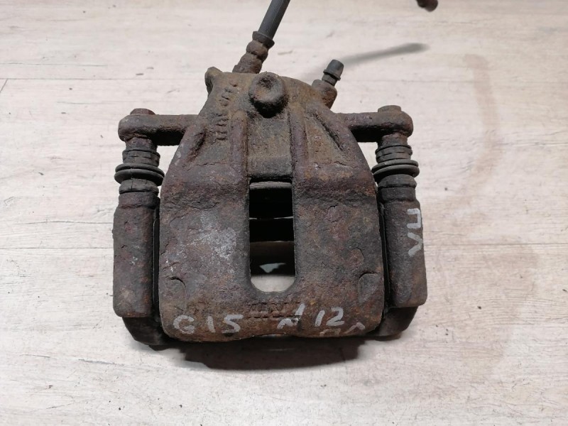 Almera G15 суппорт левый