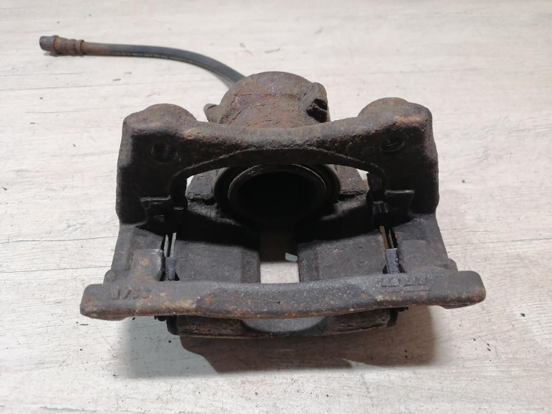 Almera G15 суппорт левый