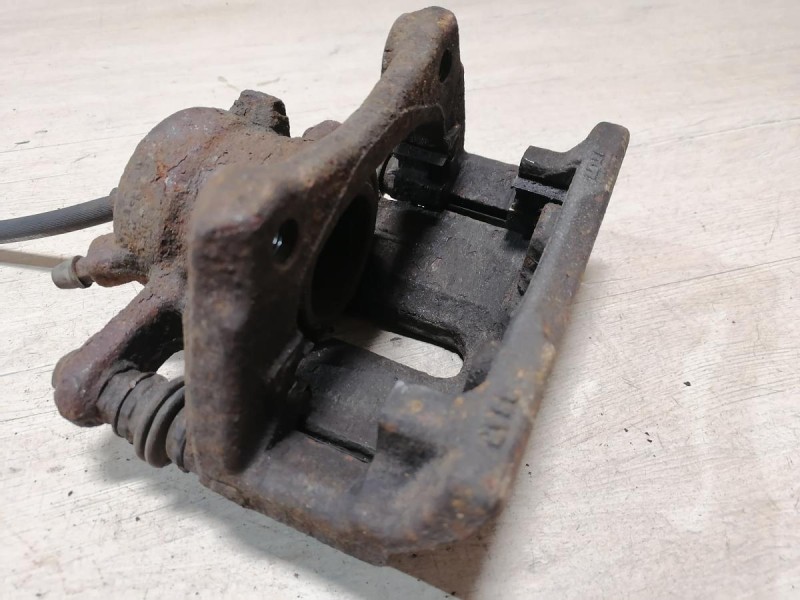 Almera G15 суппорт левый