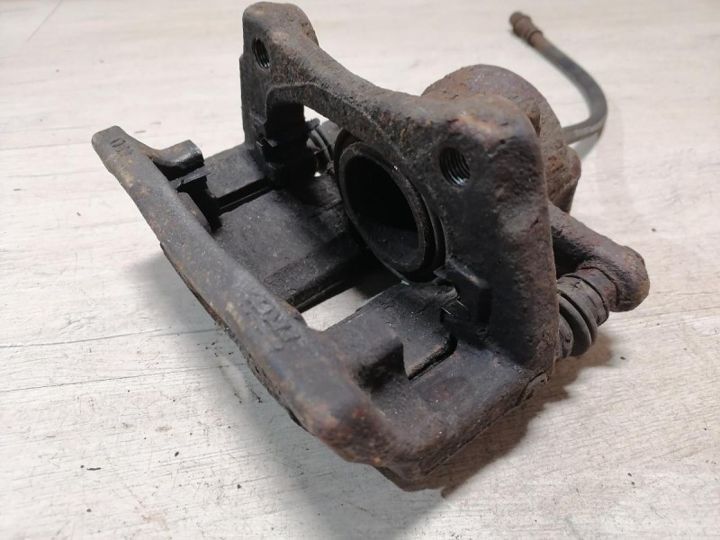 Almera G15 суппорт левый