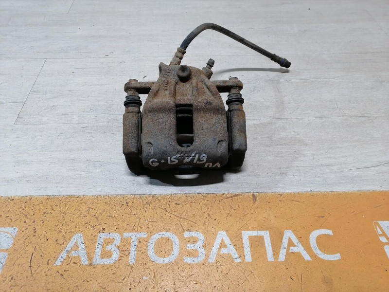Almera G15 суппорт левый