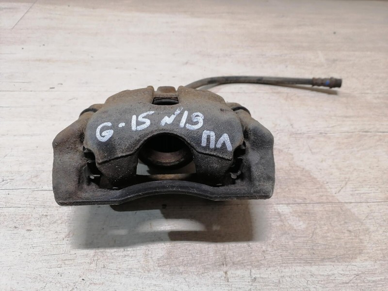 Almera G15 суппорт левый