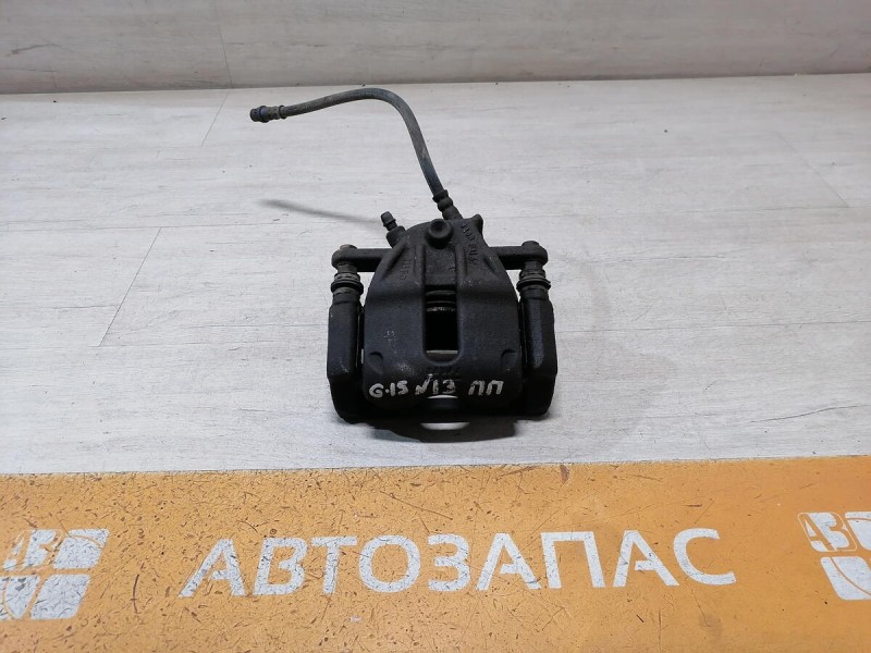 Almera G15 суппорт правый