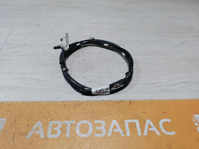 Almera G15 трос багажника