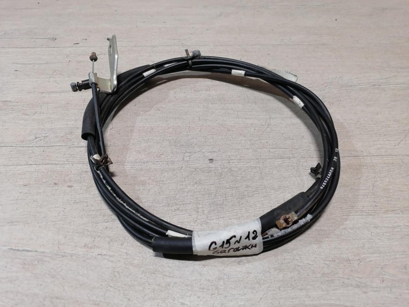 Almera G15 трос багажника