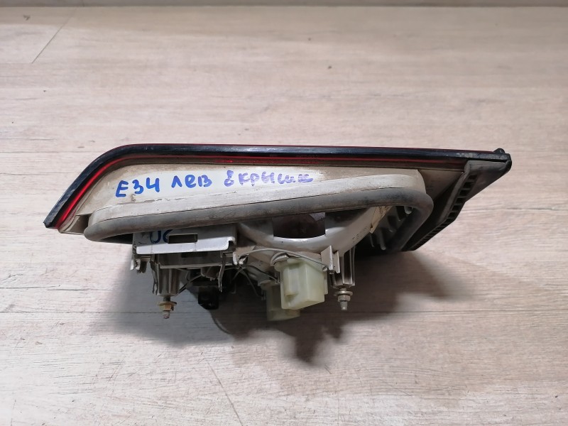 BMW E34 фонарь в крышку багажника левый