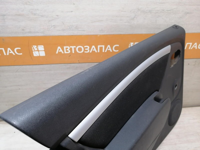 Sandero 1 обшивка двери задняя левая мех