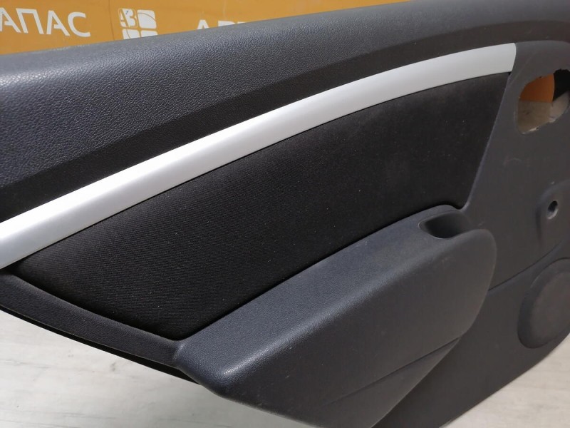 Sandero 1 обшивка двери задняя левая мех