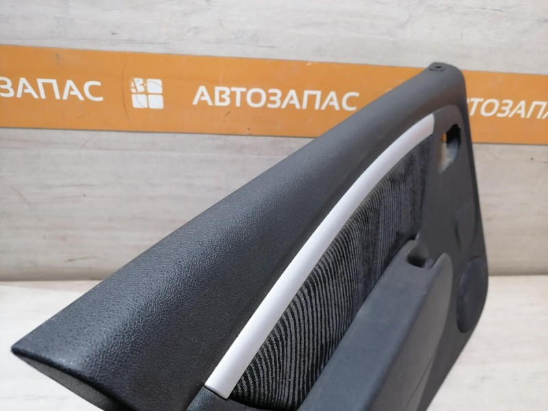 Sandero 1 обшивка двери задняя левая эл