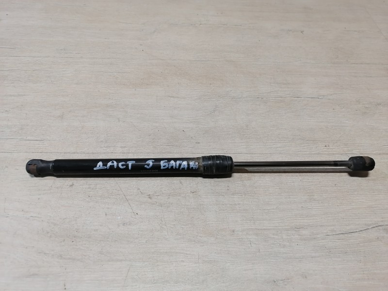 Duster №5 амортизатор багажника деф