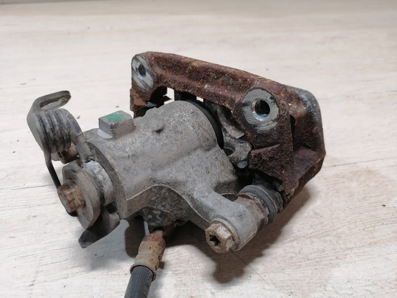 Ceed №4 суппорт задний левый 1,4