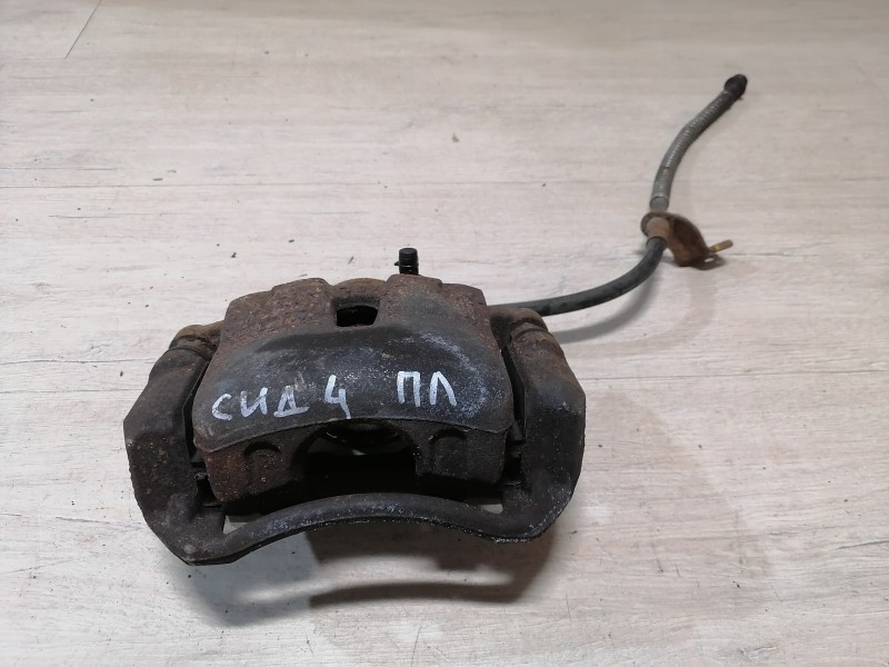 Ceed №4 суппорт передний левый 1,4