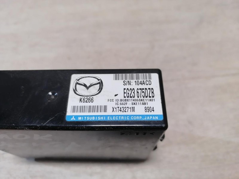 Mazda CX7 блок управления центральным замком eg23675dzb