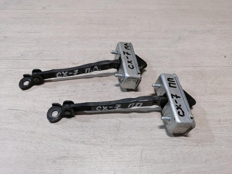 Mazda CX7 ограничитель двери передний