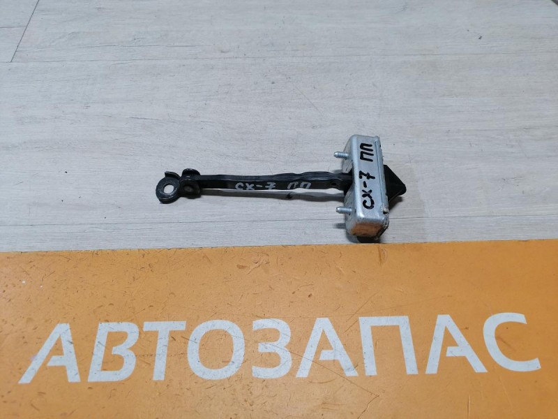 Mazda CX7 ограничитель двери передний