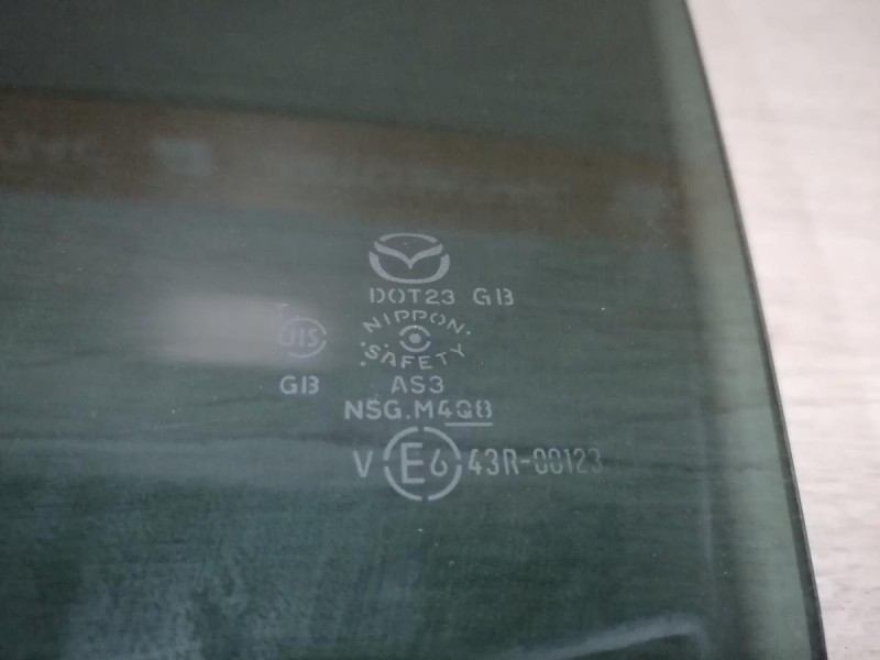 Mazda CX7 стекло двери заднее левое