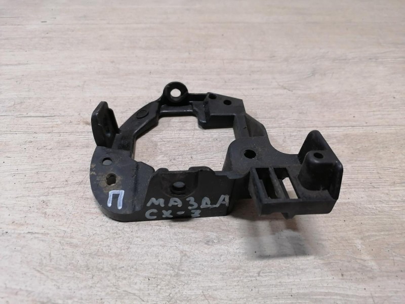 Mazda CX7 кронштейн противотуманки правый