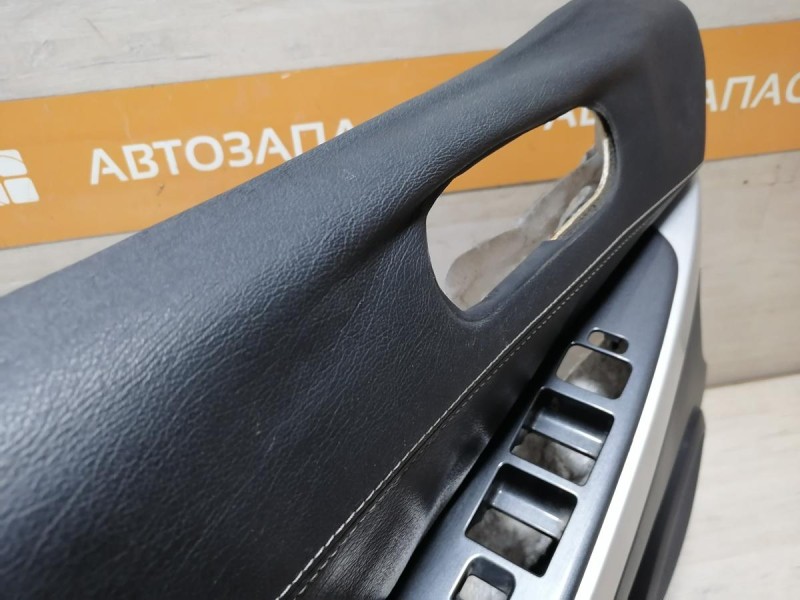 Mazda CX7 обшивка двери передняя левая деф