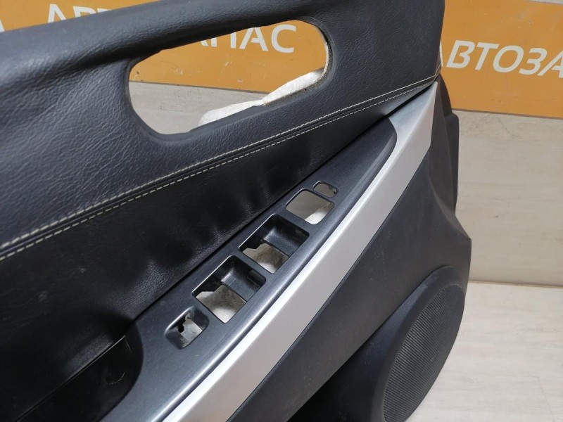 Mazda CX7 обшивка двери передняя левая деф