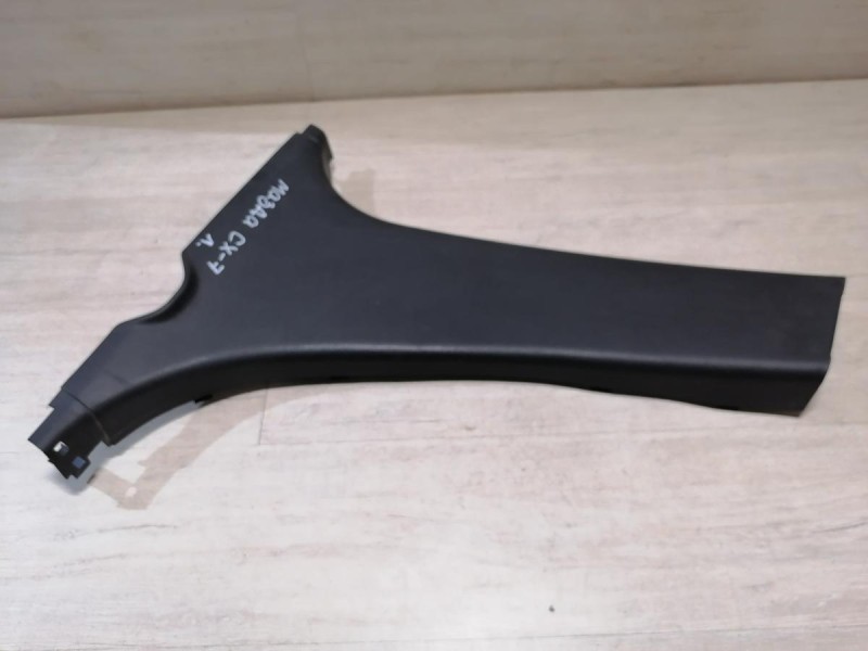 Mazda CX7 обшивка средней стойки нижняя левая