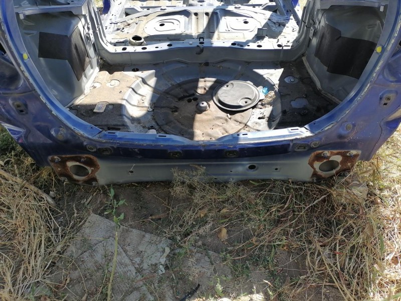 Mazda CX7 панель задняя ниша под запаску