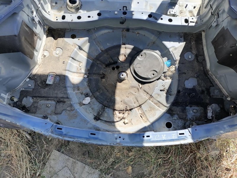 Mazda CX7 панель задняя ниша под запаску