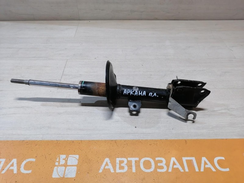 Arkana амортизатор передний