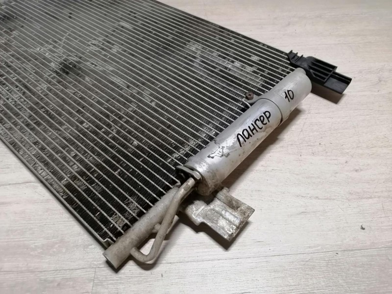 Lancer 10 №1 радиатор кондиционера деф