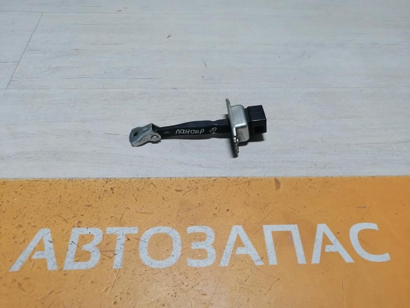 Lancer 10 №1 ограничитель двери передний