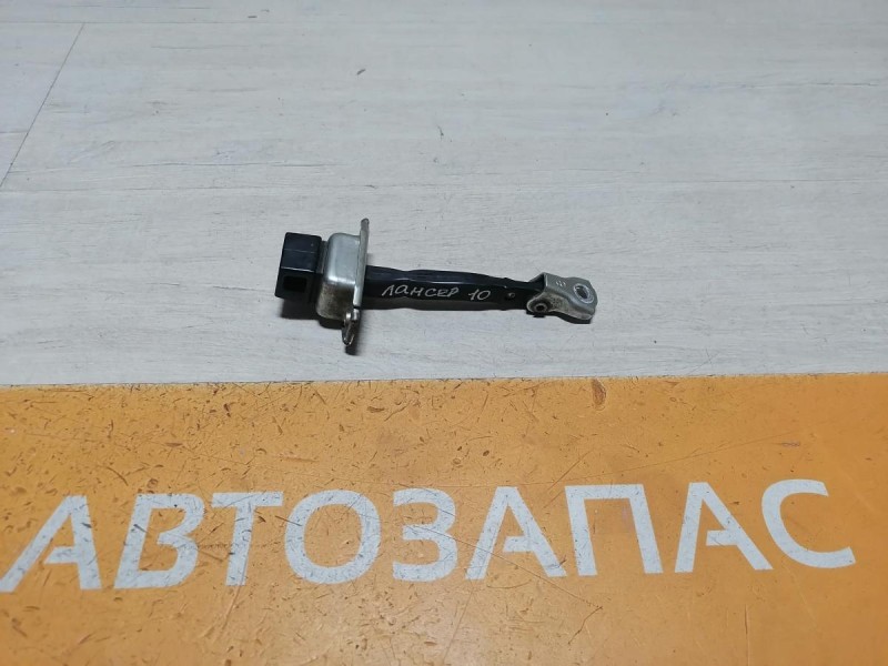Lancer 10 №1 ограничитель двери задний