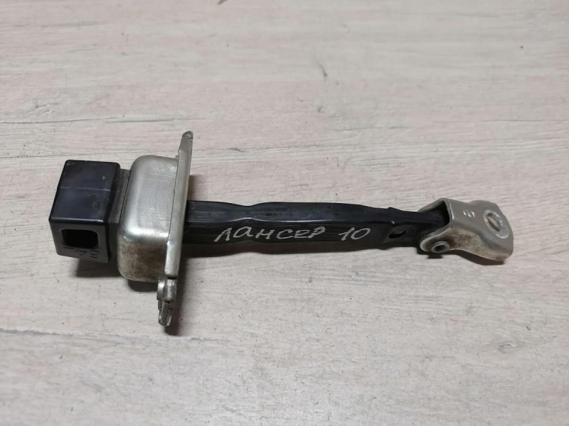 Lancer 10 №1 ограничитель двери задний