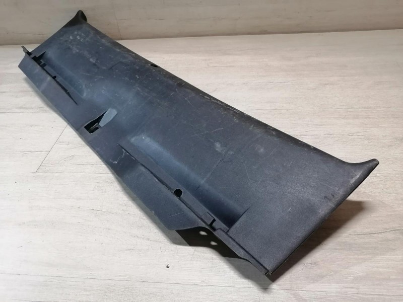 Lancer 10 №1 обшивка задней панели накладка